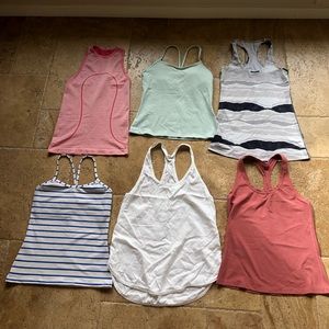 6 Lululemon tops sizes 4, 6, 8!